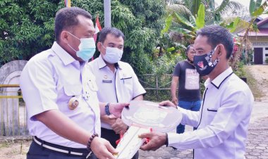 Bupati Kampar Serahkan Bantuan Ambulance di Gunung Sahilan