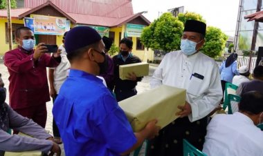 Bupati Siak Bantu Masker untuk Seluruh Rumah Ibadah di Kampung Perawang Barat