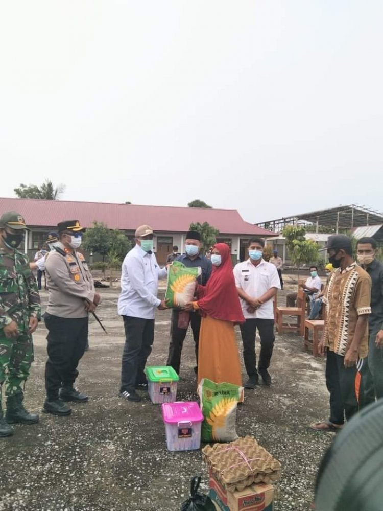 Tinjau Vaksinasi Covid-19 Massal di Kampung Teluk Lanus, Bupati Siak Kembali Serukan Prokes