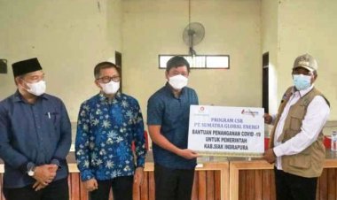 Bupati Siak Alfedri Serahkan 3.000 Masker Bantuan ke Tiga Kampung di Sungai Apit