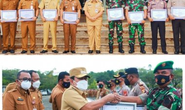 Target Vaksinasi Dosis I Tercapai, Bupati Rohul Beri Piagam Penghargaan