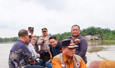 Pj Sekda Kampar Tinjau TPS Terdampak Banjir di Desa Lubuk Siam dan Tanjung Balam Siak Hulu