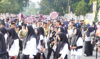 KPU Riau Gelar Jalan Sehat Menuju Pilkada Riau 2024 di Car Free Day Pekanbaru 17 November 2024