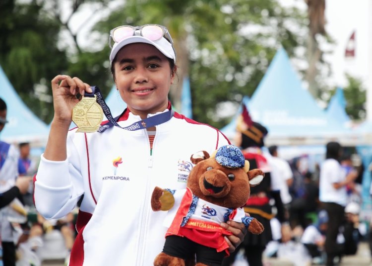 Triyaningsih Atlet Kemenpora Berlari Meraih Medali Emas di Pornas Korpri XVII Tahun 2025 Palembang