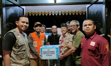 Pramuka Peduli Binawidya Serahkan Donasi Korban Bencana Sumatera kepada Kwarcab Pekanbaru 