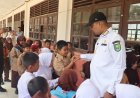 Bupati Inhu Hadiri Hari Jadi ke-22 Kecamatan Batang Peranap, Serahkan Bantuan hingga Motivasi Siswa